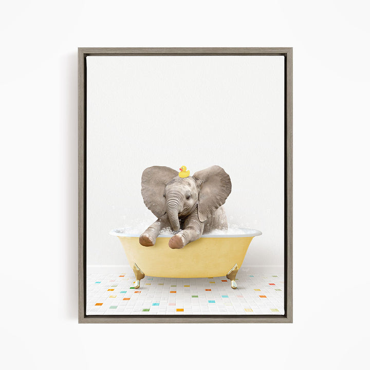A baby elephant sitting in a yellow bathtub, with a rubber duck on its head, enjoying a bath.