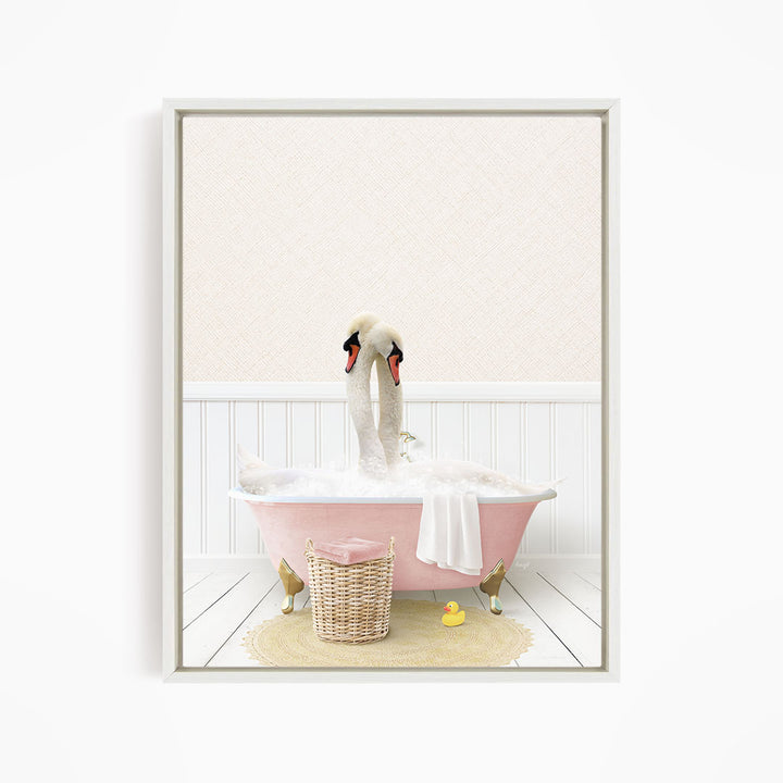 A pink clawfoot bathtub filled with bubbles, with two swans sitting inside and one duck standing on the edge.