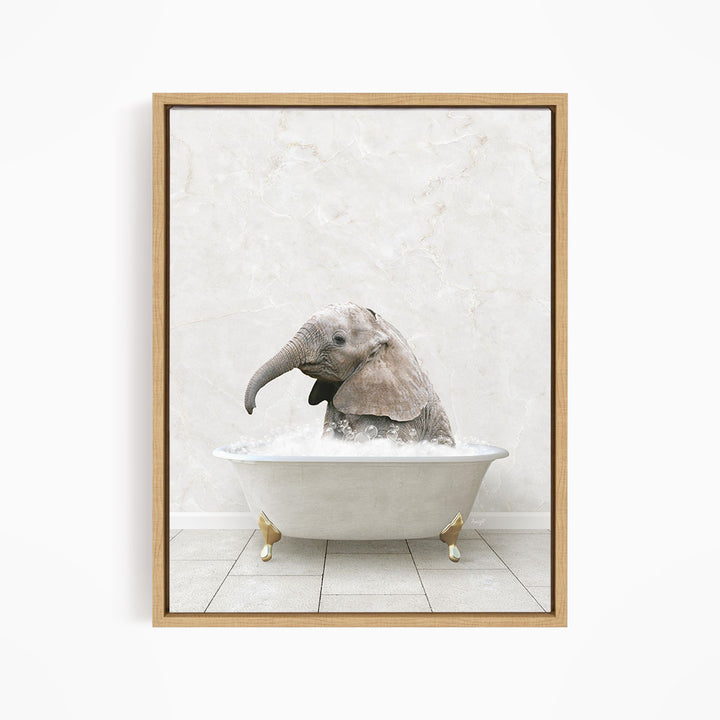 A baby elephant sitting in a white bathtub filled with water, with its trunk submerged in the water.