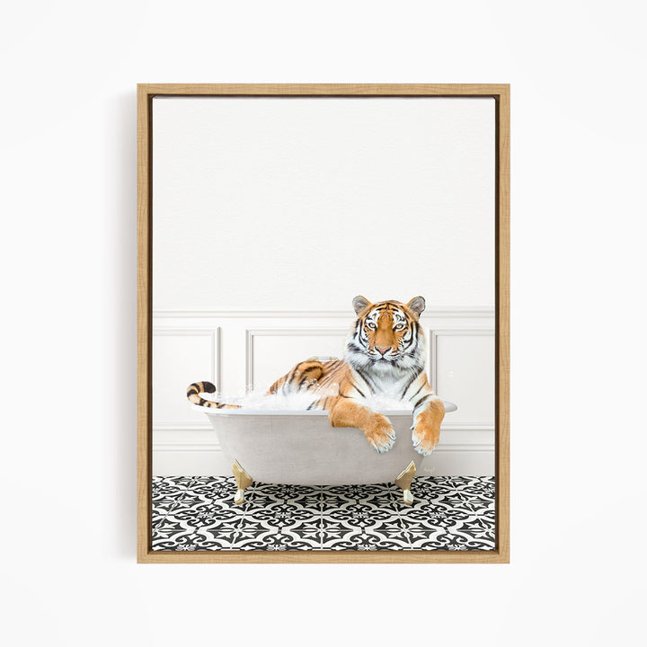 A tiger is sitting in a white bathtub, surrounded by a black and white patterned floor.