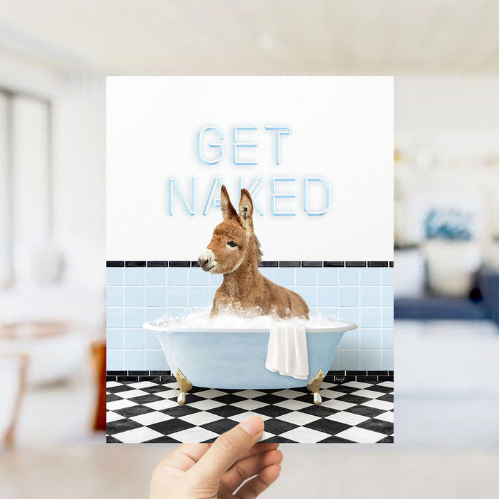 A donkey sitting in a bathtub with the text "GET NAKED" displayed above it.
