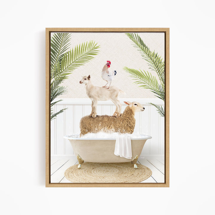 A framed image depicting a goat standing on a sheep's back while a chicken sits on top of the sheep, all in a bathtub surrounded by palm leaves.