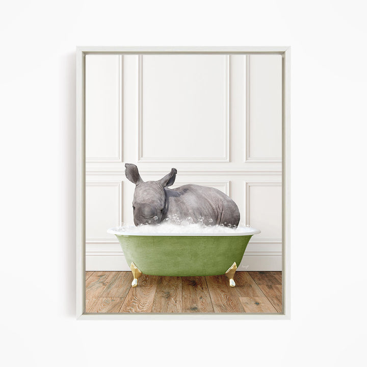 A rhinoceros is sitting in a green bathtub filled with water, creating a whimsical and playful scene.