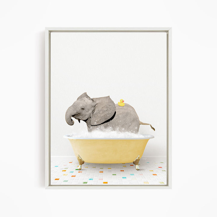 A gray elephant is sitting in a yellow bathtub, with a yellow rubber duck perched on its back.