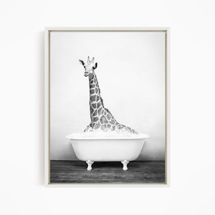 A giraffe sitting in a white bathtub filled with water, creating a whimsical and playful scene.