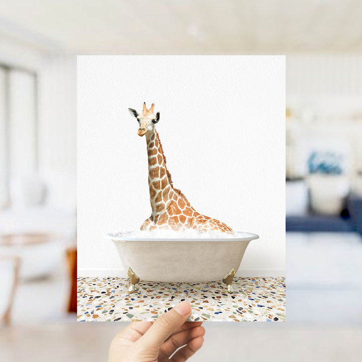 A giraffe sitting in a bathtub filled with water, creating a whimsical and playful scene.