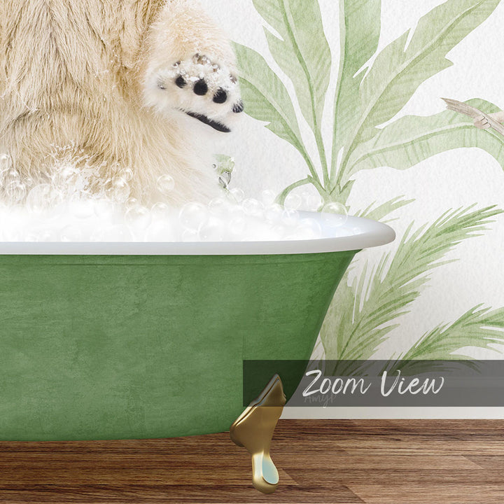 A fluffy white cat is sitting in a green bathtub filled with bubbles, with a palm tree wallpaper in the background.