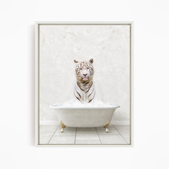 A white tiger sitting in a white bathtub filled with water, with its mouth open and tongue sticking out.