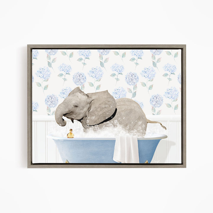 A gray elephant is taking a bath in a blue bathtub, surrounded by a floral patterned wall.