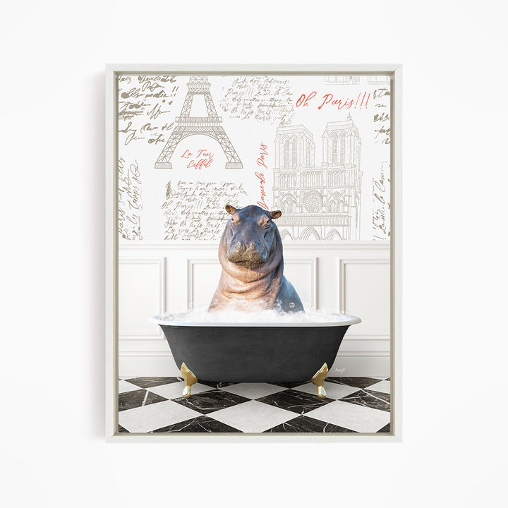 A framed image depicting a hippopotamus sitting in a bathtub, with a Paris-themed background featuring the Eiffel Tower and other Parisian landmarks.