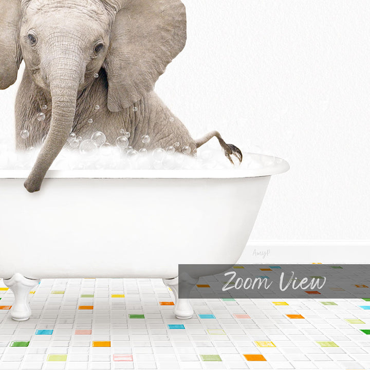 A baby elephant sitting in a white bathtub filled with bubbles, surrounded by a colorful tiled floor.