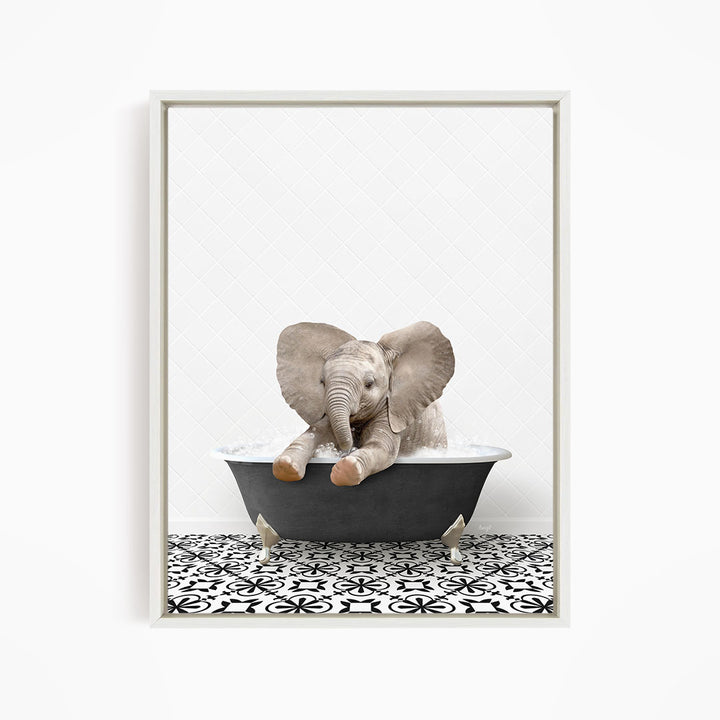 A baby elephant sitting in a bathtub filled with water, surrounded by a black and white patterned floor.