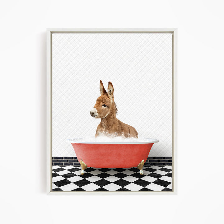 A donkey is sitting in a red bathtub filled with water, surrounded by a black and white checkered floor.