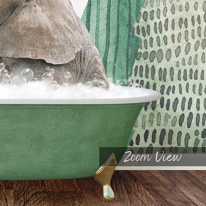 A green bathtub filled with bubbles, with a large elephant sitting inside.
