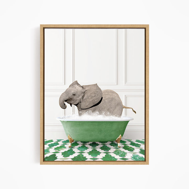 A gray elephant is sitting in a green bathtub filled with water, surrounded by a green and white patterned floor.