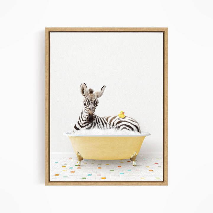 A zebra is sitting in a yellow bathtub, with a yellow rubber duck resting on its back.