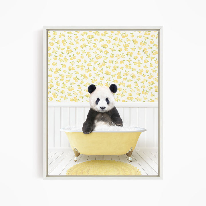 A panda bear sitting in a yellow bathtub filled with bubbles, surrounded by a yellow floral wallpaper.