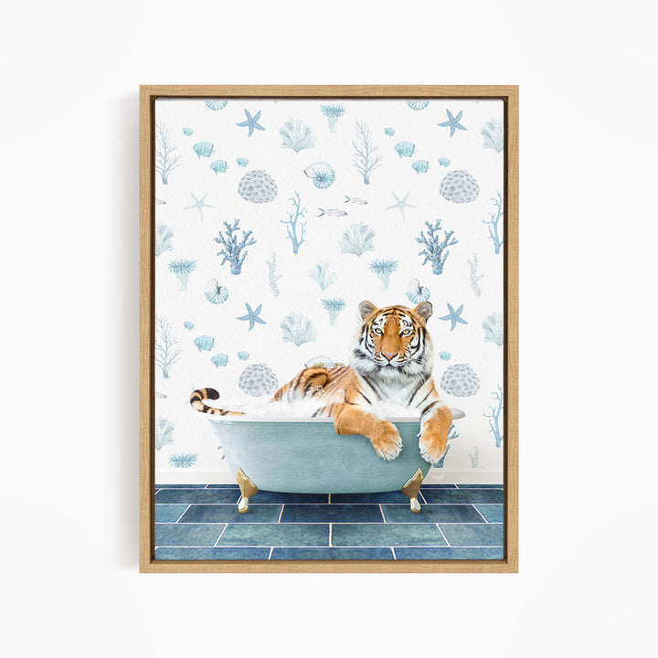 A tiger is sitting in a bathtub filled with water, surrounded by a blue and white patterned wall.