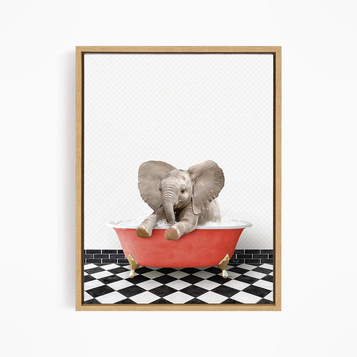 A baby elephant sitting in a red bathtub on a black and white checkered floor.