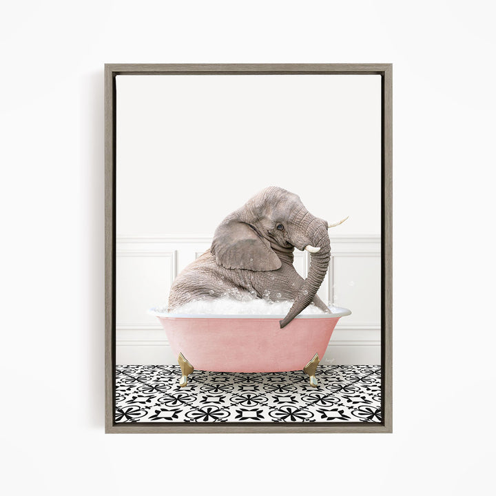 A gray elephant is sitting in a pink bathtub filled with water, surrounded by a black and white patterned floor.