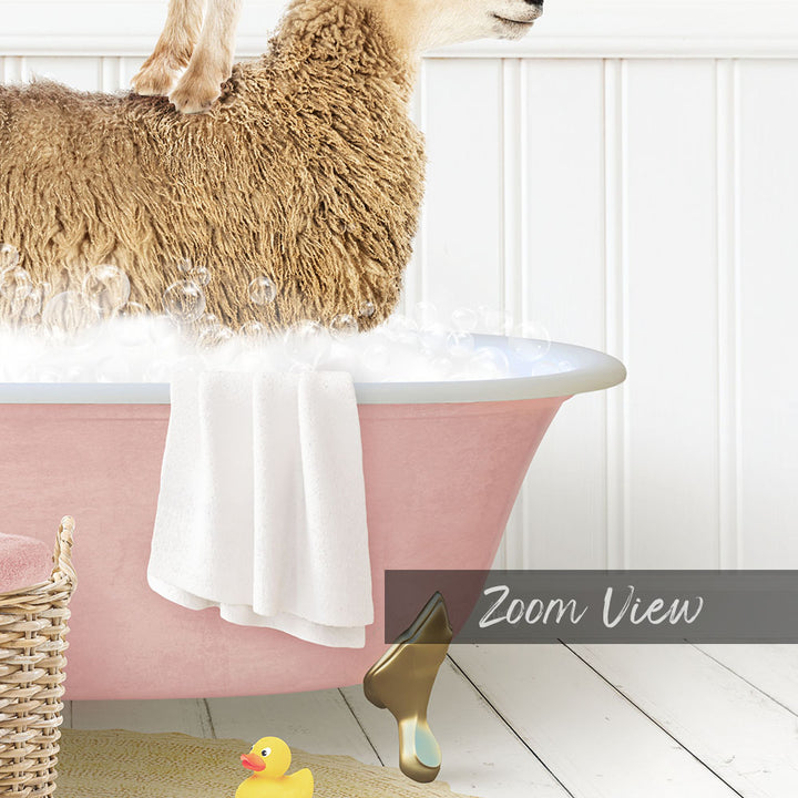 A fluffy brown sheep is sitting in a pink bathtub filled with water, surrounded by a yellow rubber duck and a white towel.
