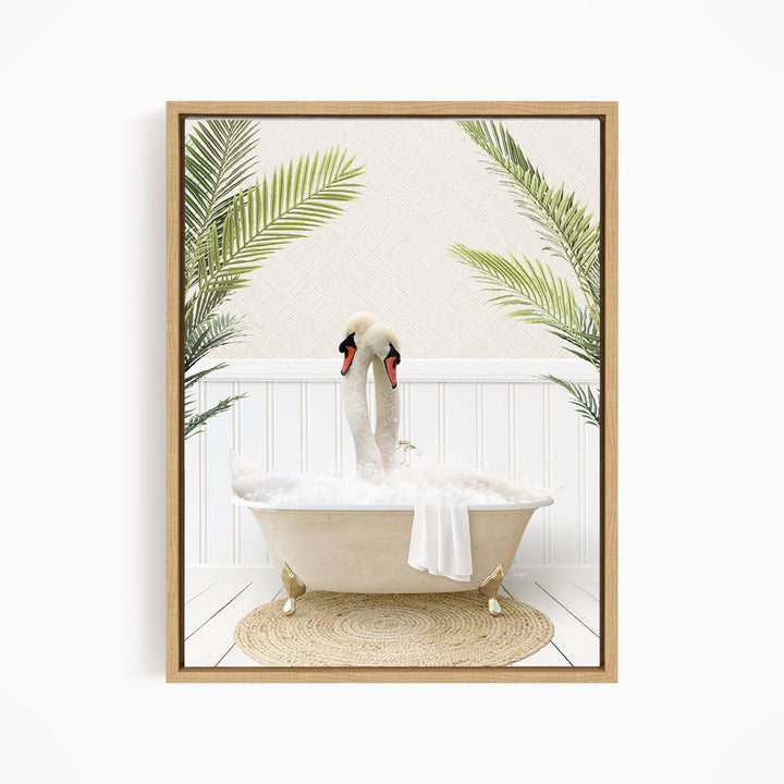 A framed image depicting two swans sitting in a bathtub, surrounded by green leaves.