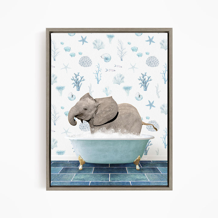 A gray elephant is sitting in a blue bathtub filled with water, surrounded by a pattern of blue and white seashells and starfish.