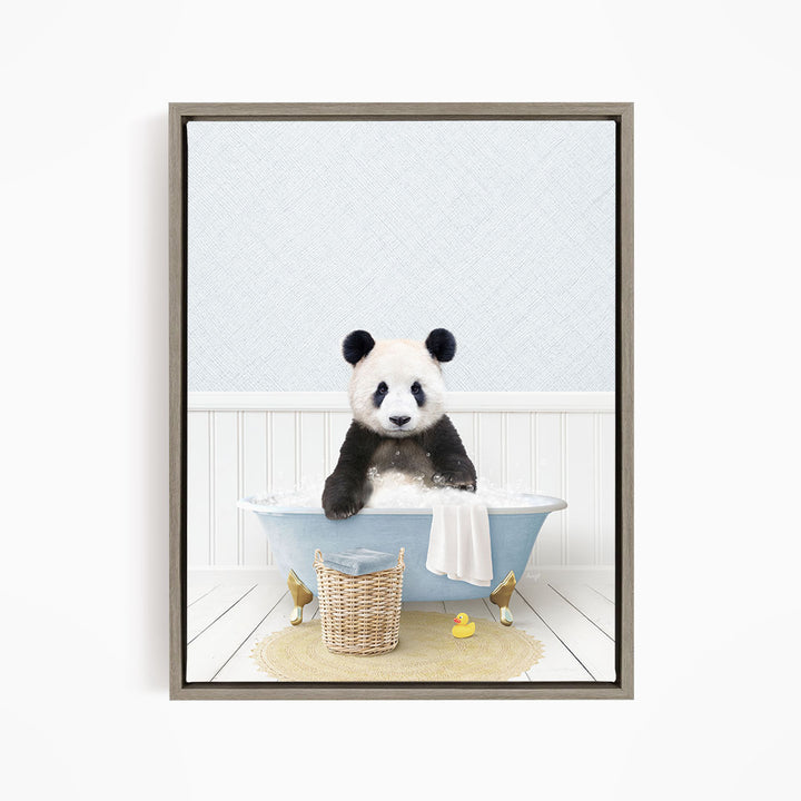 A panda bear sitting in a blue bathtub filled with bubbles, surrounded by rubber ducks and a basket.