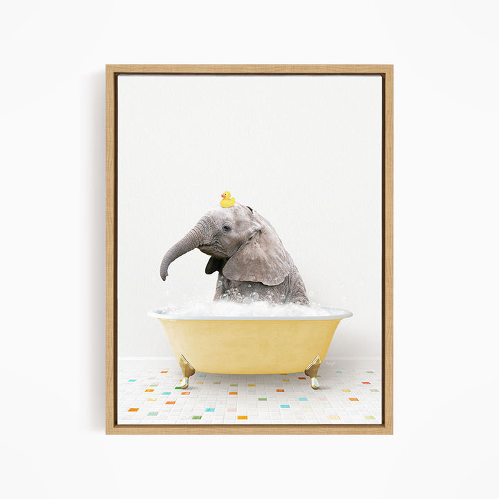 A gray elephant is sitting in a yellow bathtub, with a yellow rubber duck perched on its head.