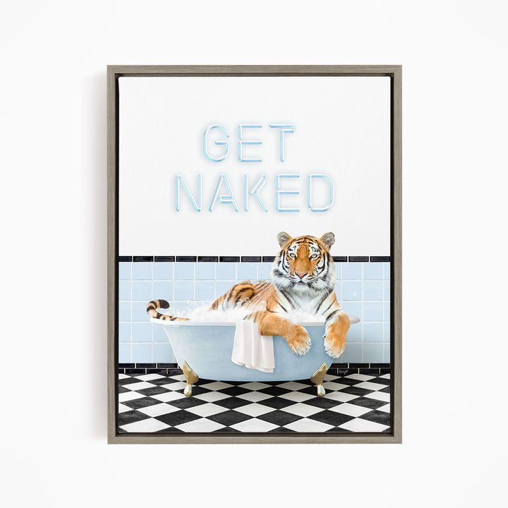 A tiger sitting in a bathtub with the text "GET NAKED" displayed above it.