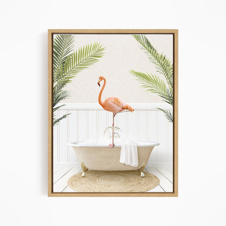 A framed image depicting a pink flamingo standing on a white bathtub, surrounded by green palm leaves.