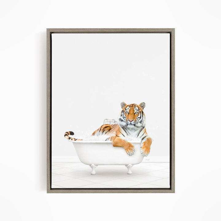A tiger is sitting in a white bathtub, appearing relaxed and comfortable.