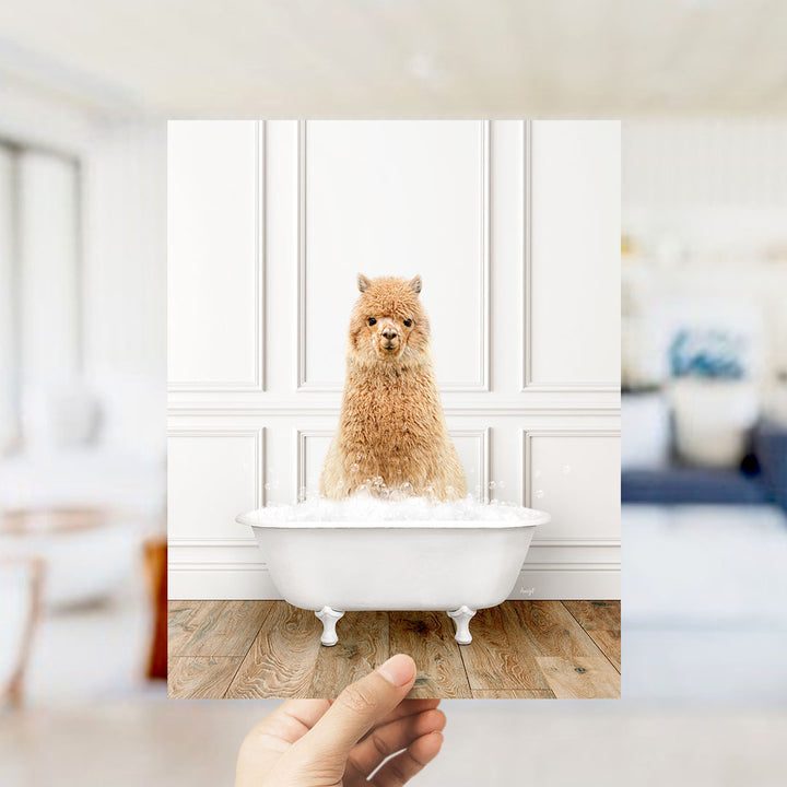 A fluffy brown dog sitting in a white bathtub filled with bubbles, with a blurred background suggesting a bathroom setting.