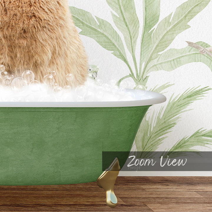 A cat is sitting in a green bathtub filled with bubbles, with a palm tree wallpaper in the background.