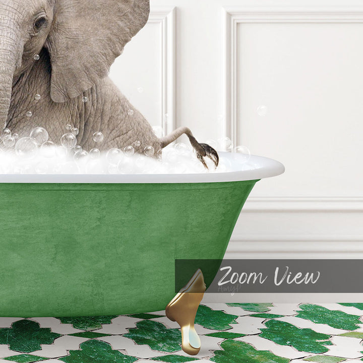 A large elephant is sitting in a green bathtub filled with bubbles, with its foot in the water.
