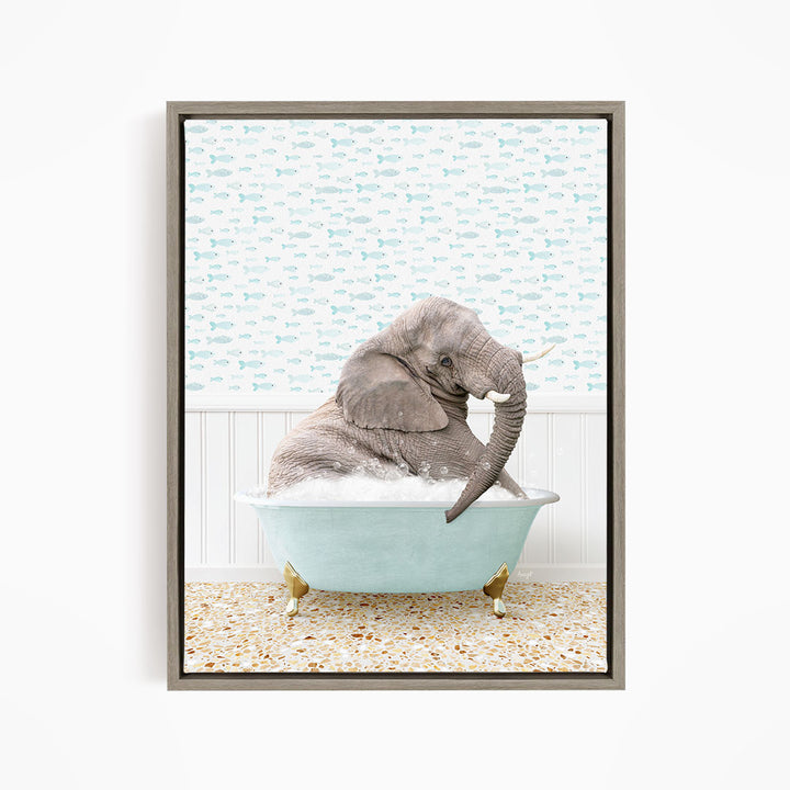 A gray elephant is sitting in a light blue bathtub filled with water, surrounded by a pattern of small fish.