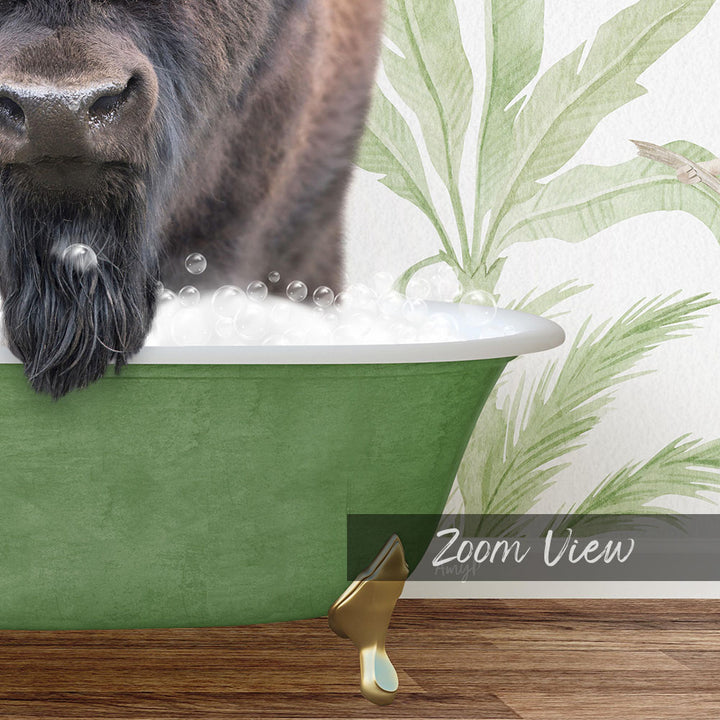 A close-up of a dog's face peeking over the edge of a green bathtub filled with bubbles, with a green leaf patterned wall in the background.