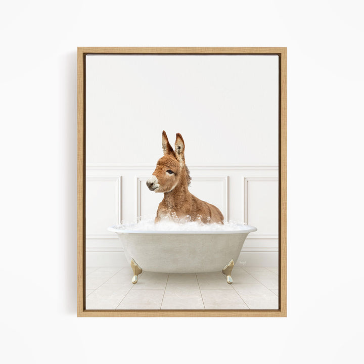 A donkey is sitting in a white bathtub filled with water, creating a playful and whimsical scene.
