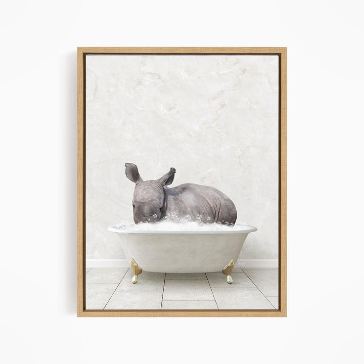 A rhinoceros is sitting in a white bathtub filled with water, creating a whimsical and playful scene.