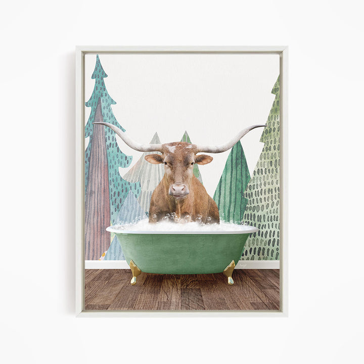 A brown cow with large horns is sitting in a green bathtub, surrounded by trees with green and brown foliage.