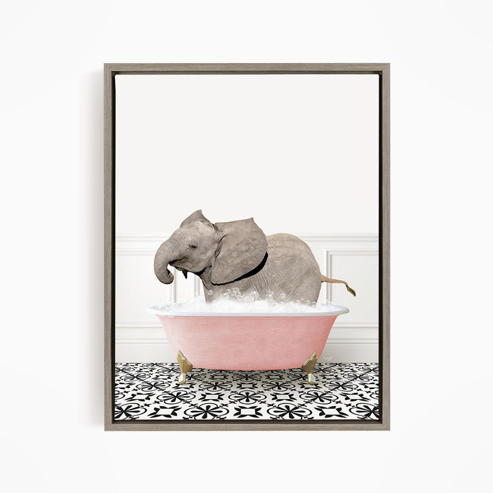 A gray elephant is standing in a pink bathtub filled with water, creating a whimsical and playful scene.