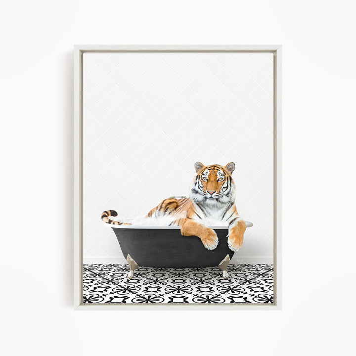 A tiger is sitting in a bathtub filled with water, surrounded by a black and white patterned floor.