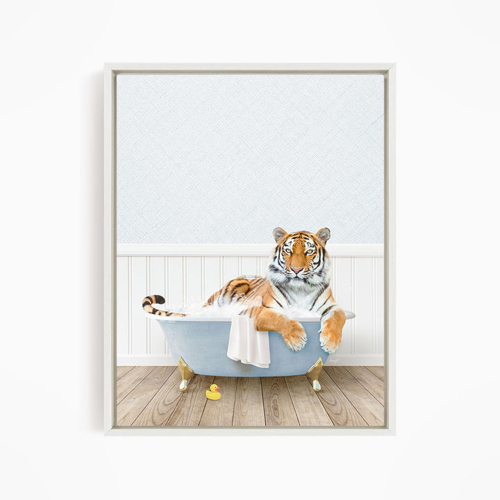 A tiger is sitting in a bathtub filled with water, surrounded by rubber ducks.