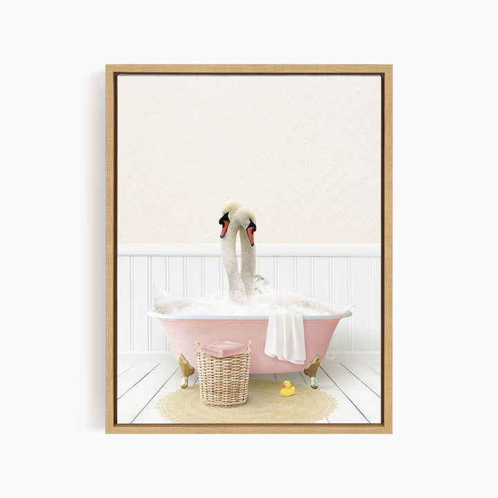 A pink bathtub filled with bubbles, with two swans sitting inside and enjoying the bath.