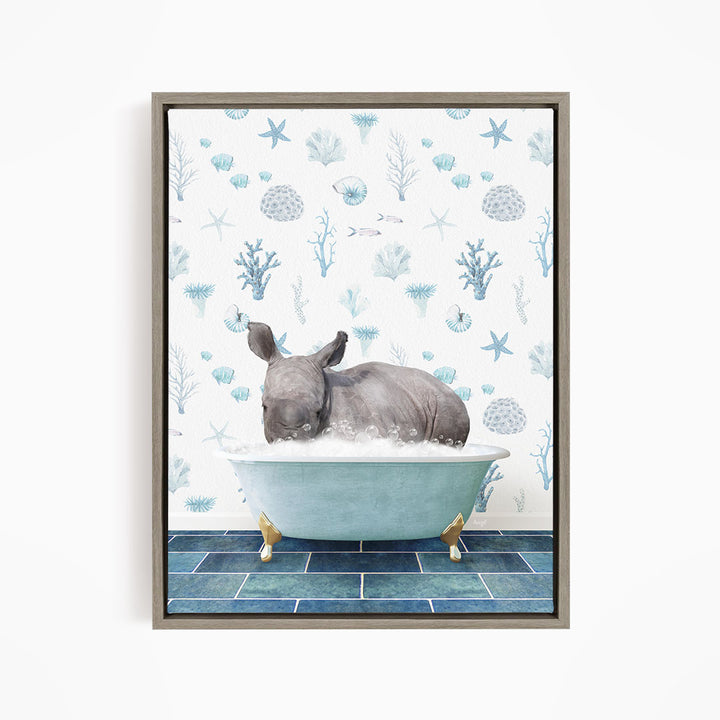 A rhinoceros is sitting in a blue bathtub filled with water, surrounded by a pattern of blue and white seashells and starfish.