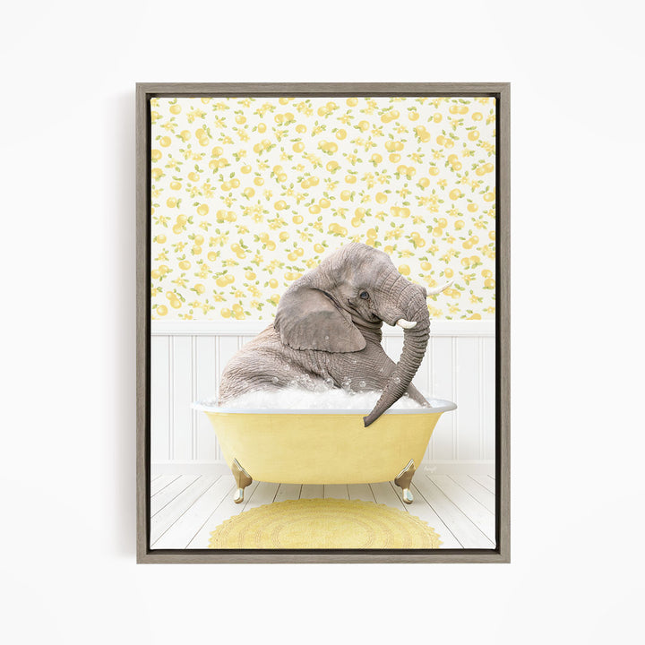 A gray elephant is sitting in a yellow bathtub filled with water, surrounded by a yellow floral pattern on the wall behind it.
