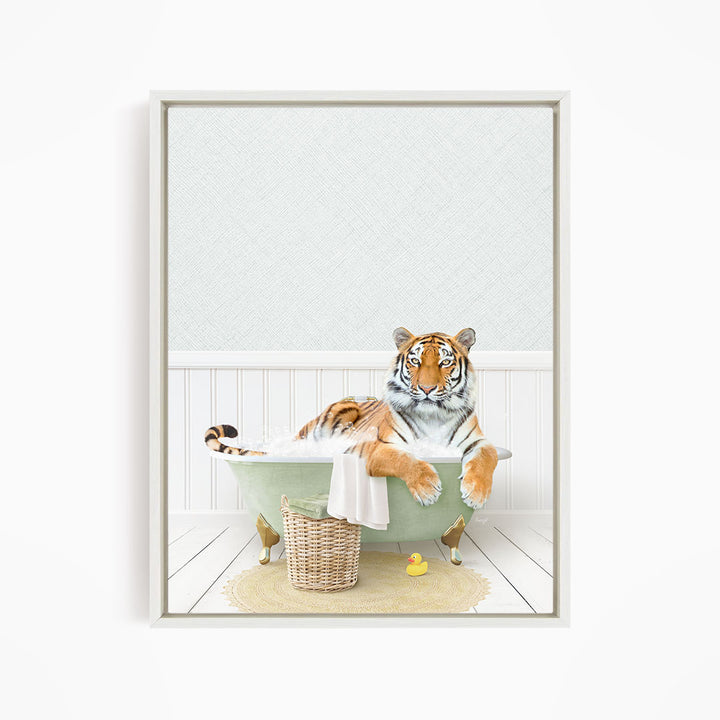 A tiger is sitting in a green bathtub, surrounded by a basket of toys and a yellow rubber duck, creating a whimsical and playful scene.