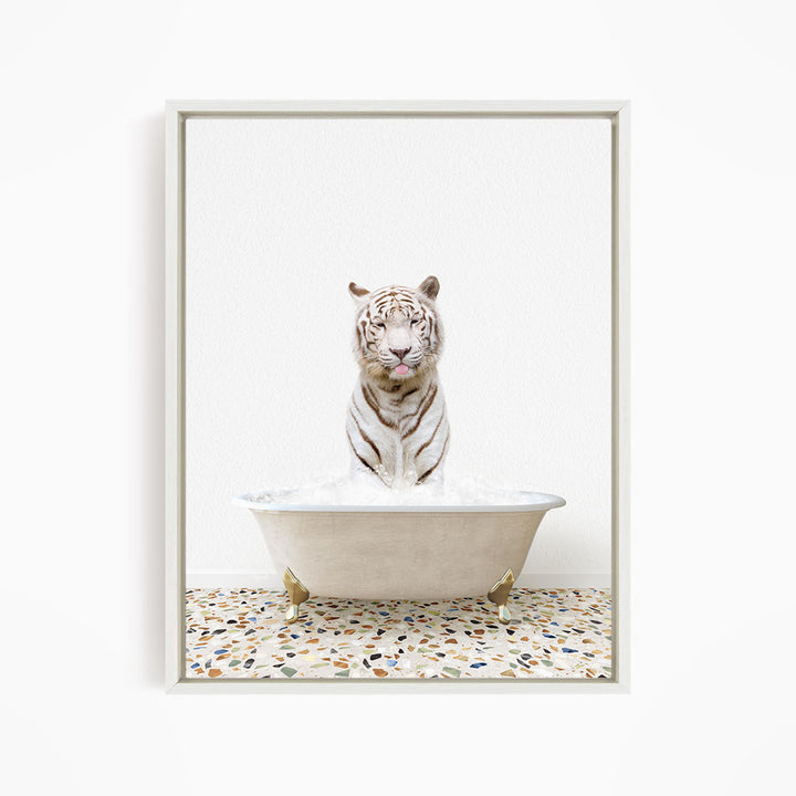 A white tiger sitting in a bathtub filled with water, with a mosaic floor in the background.