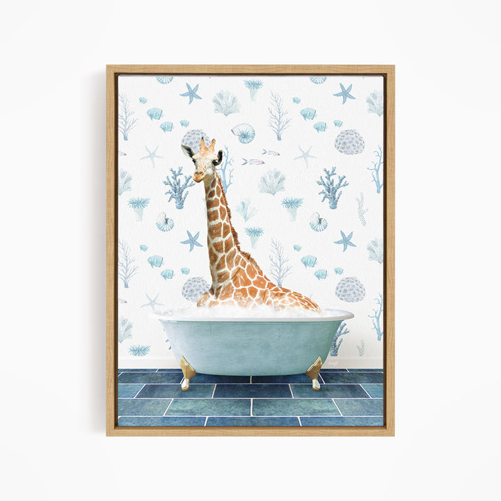 A giraffe is sitting in a bathtub filled with bubbles, surrounded by a blue and white ocean-themed wallpaper.