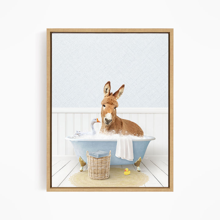 A donkey is sitting in a blue bathtub filled with bubbles, surrounded by rubber ducks and a basket.